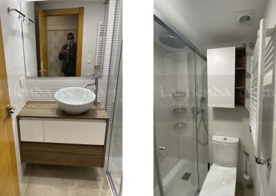 Baño DiGiovanni, Reforma, Zaragoza, Baño, Mueble a medida, amueblamiento, mueble madera, mueble madera, tirador oculto, mueble cajones, durian, corian, krion, encimera, una poza desplazada, mampara cristal, cerámica crema, cerámica lineas, suelo gris, radiador toallero, columna ducha, plato ducha pizarra, plato ducha a ras, toallero en alto, mampara de dos hojas