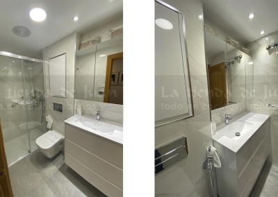 Baño DiGiovanni, Reforma, Zaragoza, Baño, Mueble a medida, amueblamiento, mueble madera, mueble madera, tirador oculto, mueble cajones, durian, corian, krion, encimera, una poza desplazada, mampara cristal, cerámica crema, cerámica lineas, suelo gris, radiador toallero, columna ducha, plato ducha pizarra, plato ducha a ras, toallero en alto, mampara de dos hojas